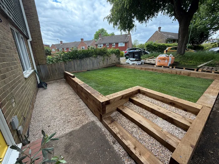 Sleeper terrace with steps up to a lawn